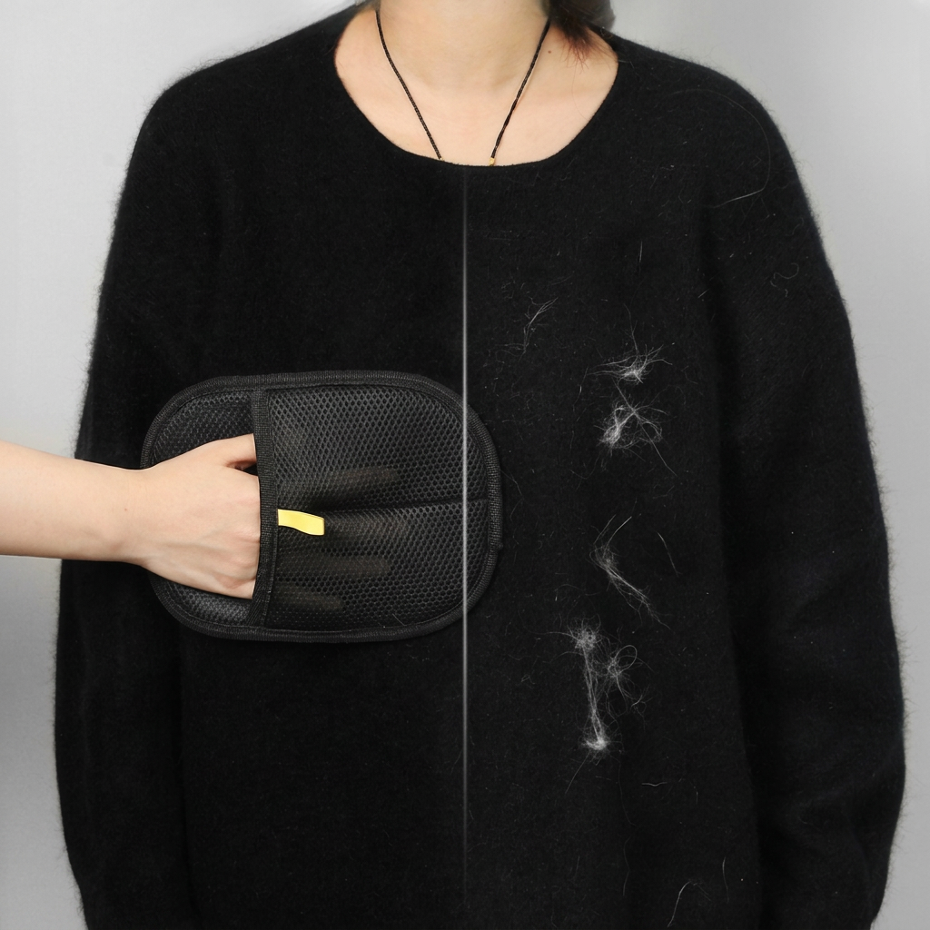 Black jumper showing cleaned fabric beside fabric with visible pet hair